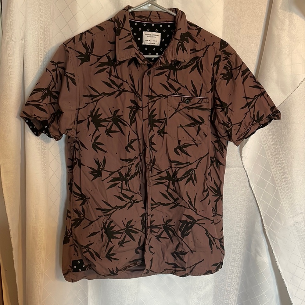 Men’s Sunrise Kingdom size medium button down shirt. Brown and black design.